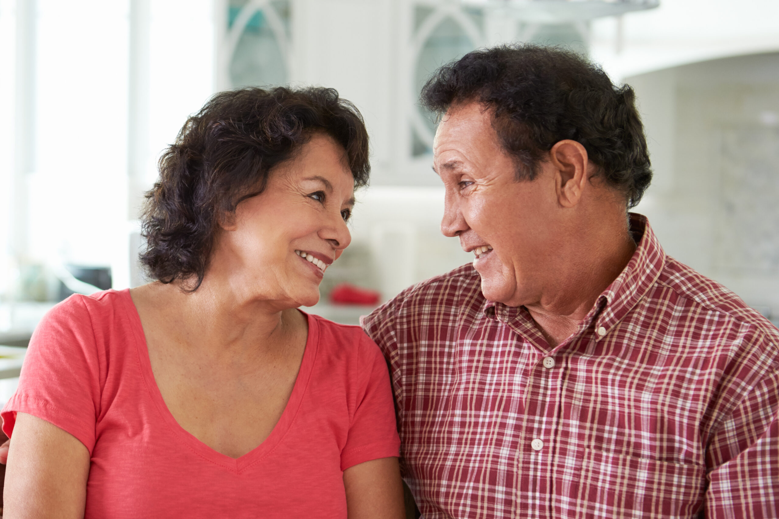 Head,And,Shoulders,Shot,Of,Senior,Hispanic,Couple,At,Home